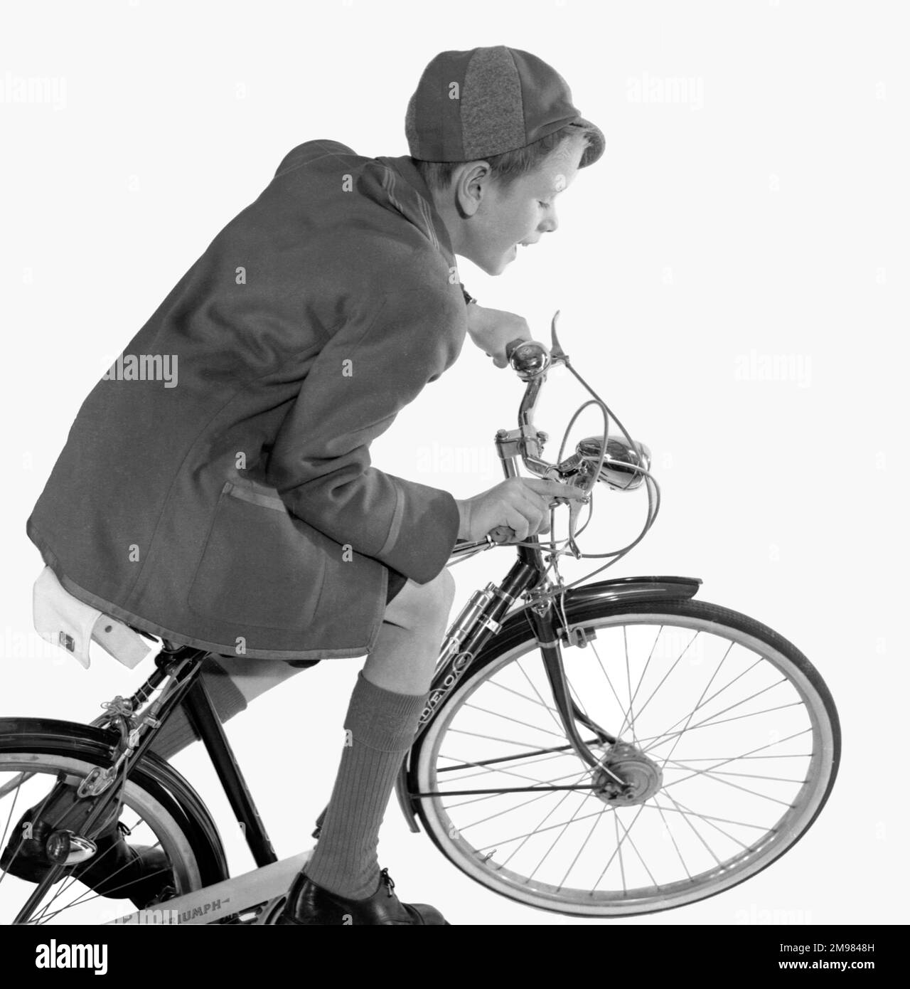 advertisement-for-triumph-bicycles-boy-model-david-scully-stock