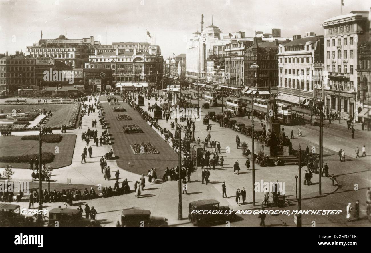 Manchester, England the busy Piccadilly Street and Piccadilly Gardens