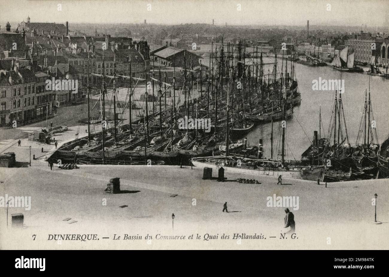 Dunkirk, France - Bassin du Commerce and the Dutch Quay. A harbour packed with sailing boats, a commercial French port and peaceful quayside. Stock Photo