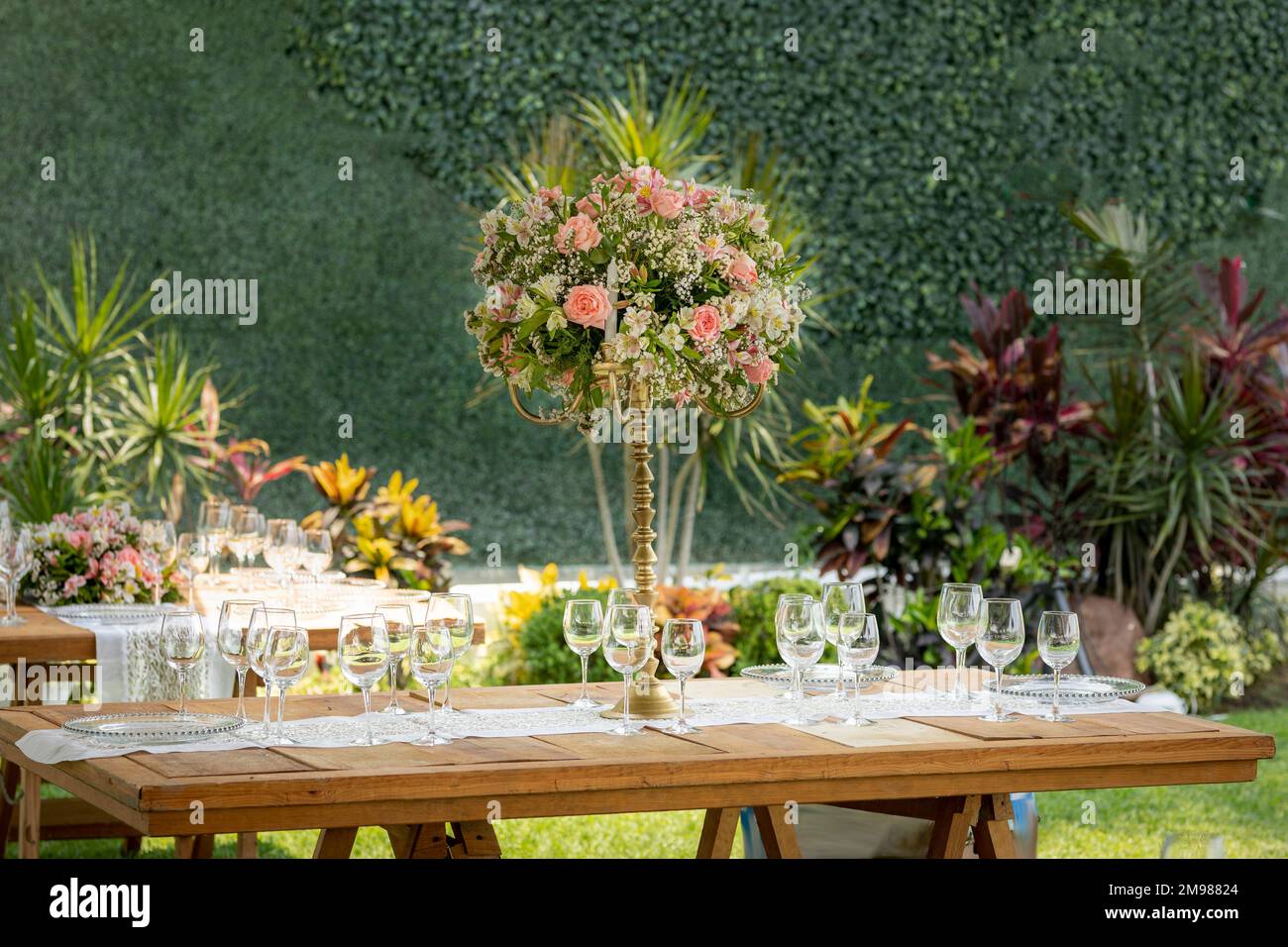 Elegant table decoration, for a social event in an outdoor garden Stock Photo
