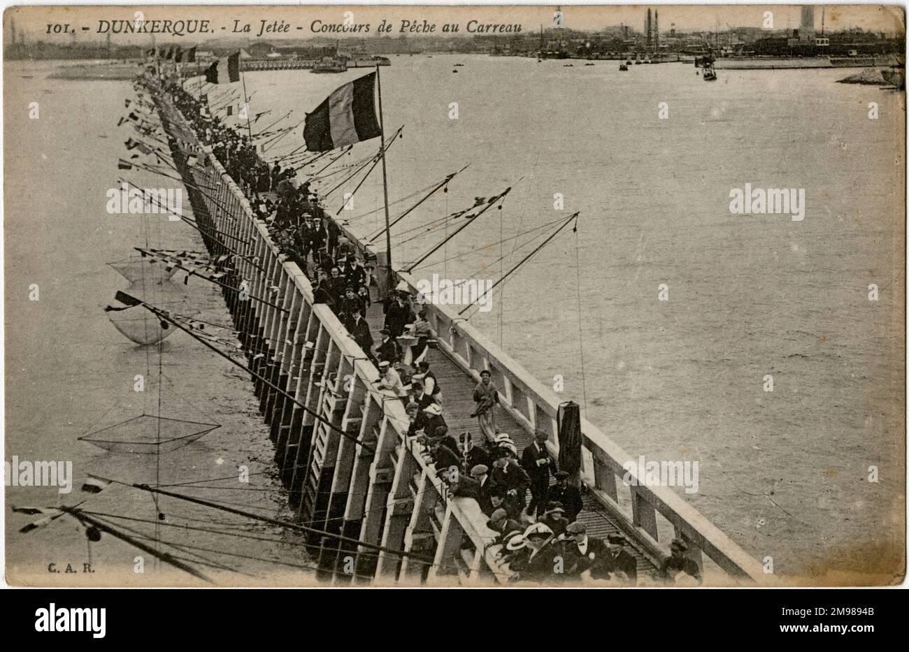 Dunkirk, France fishing competition on the jetty, using large nets