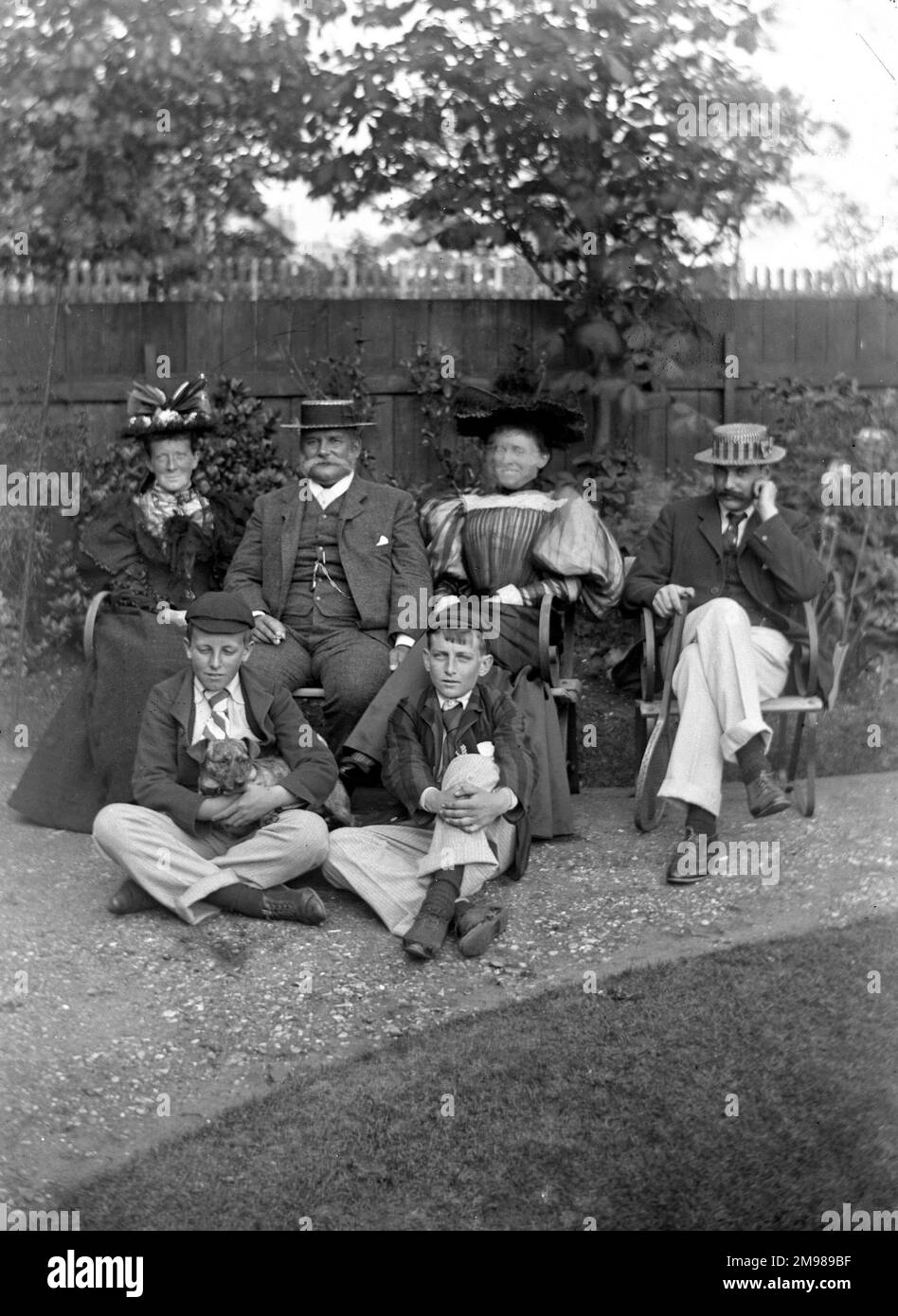 Victorian family group seated in a garden at Coltermore, Ipswich