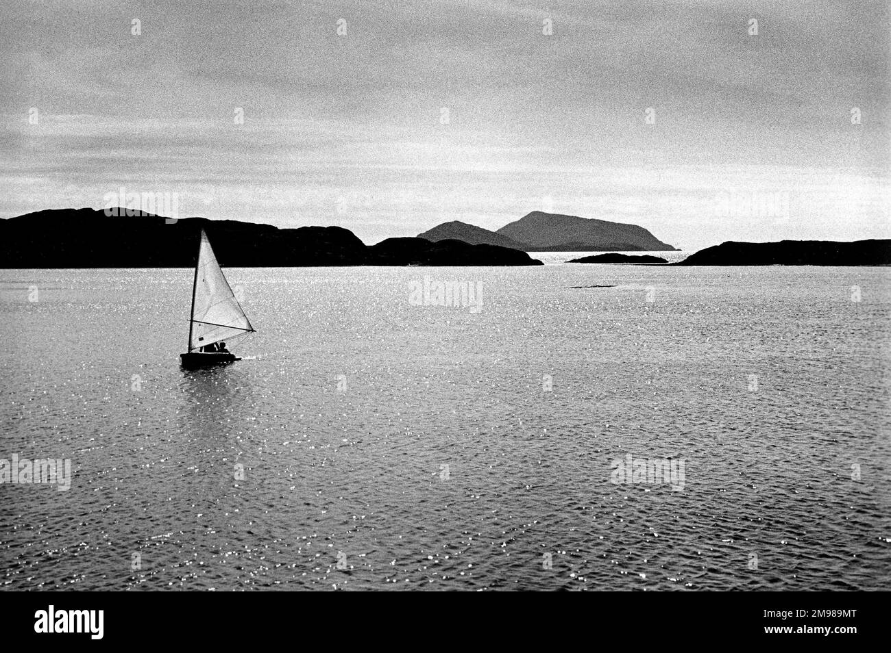 Sailing dinghy on the south-west Irish coast at the Ring of Kerry, County Kerry, Ireland. Stock Photo