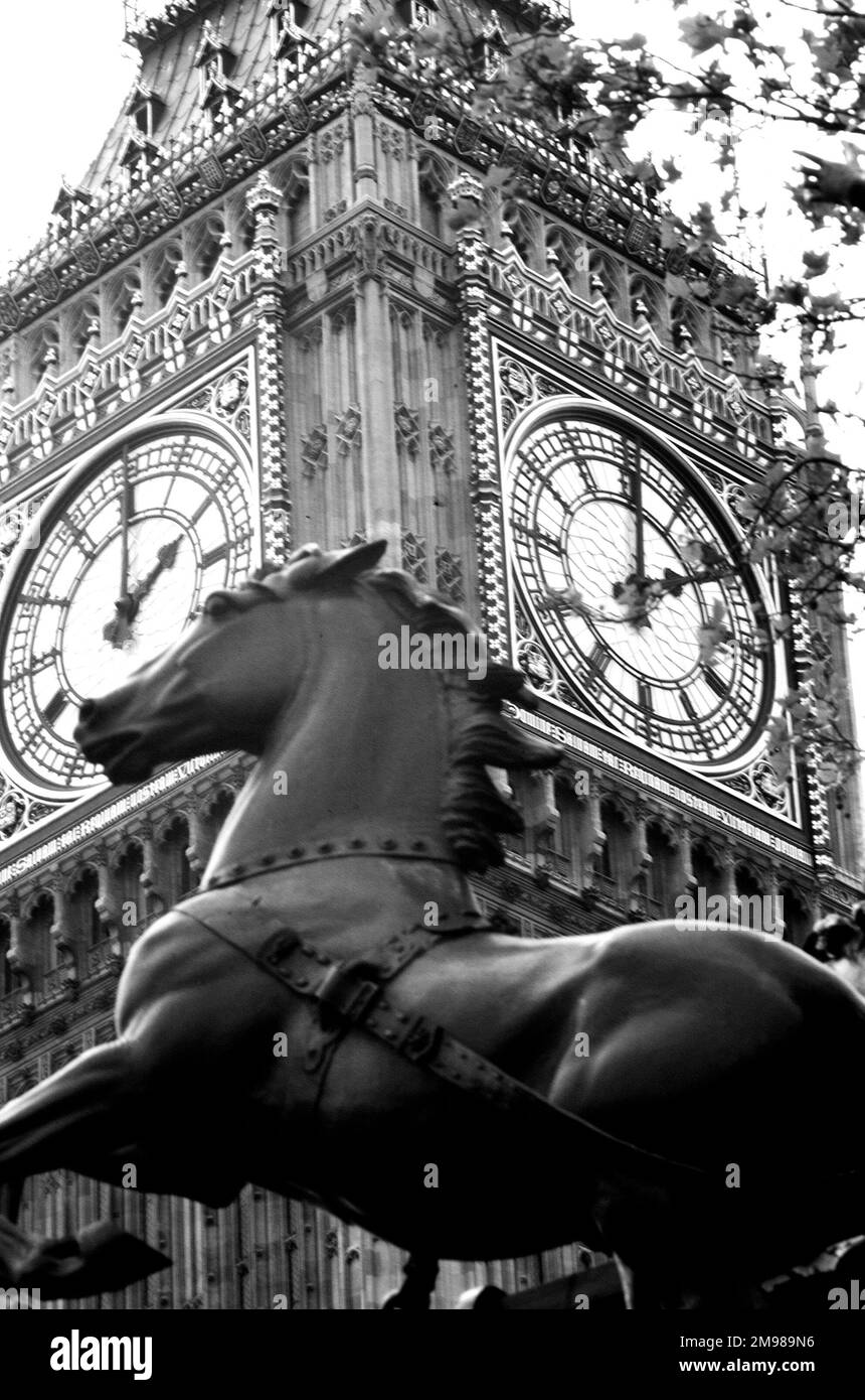 Big Ben (Elizabeth Tower), Houses of Parliament, Westminster, London, with one of the horses from the Boadicea statue in the foreground. Stock Photo