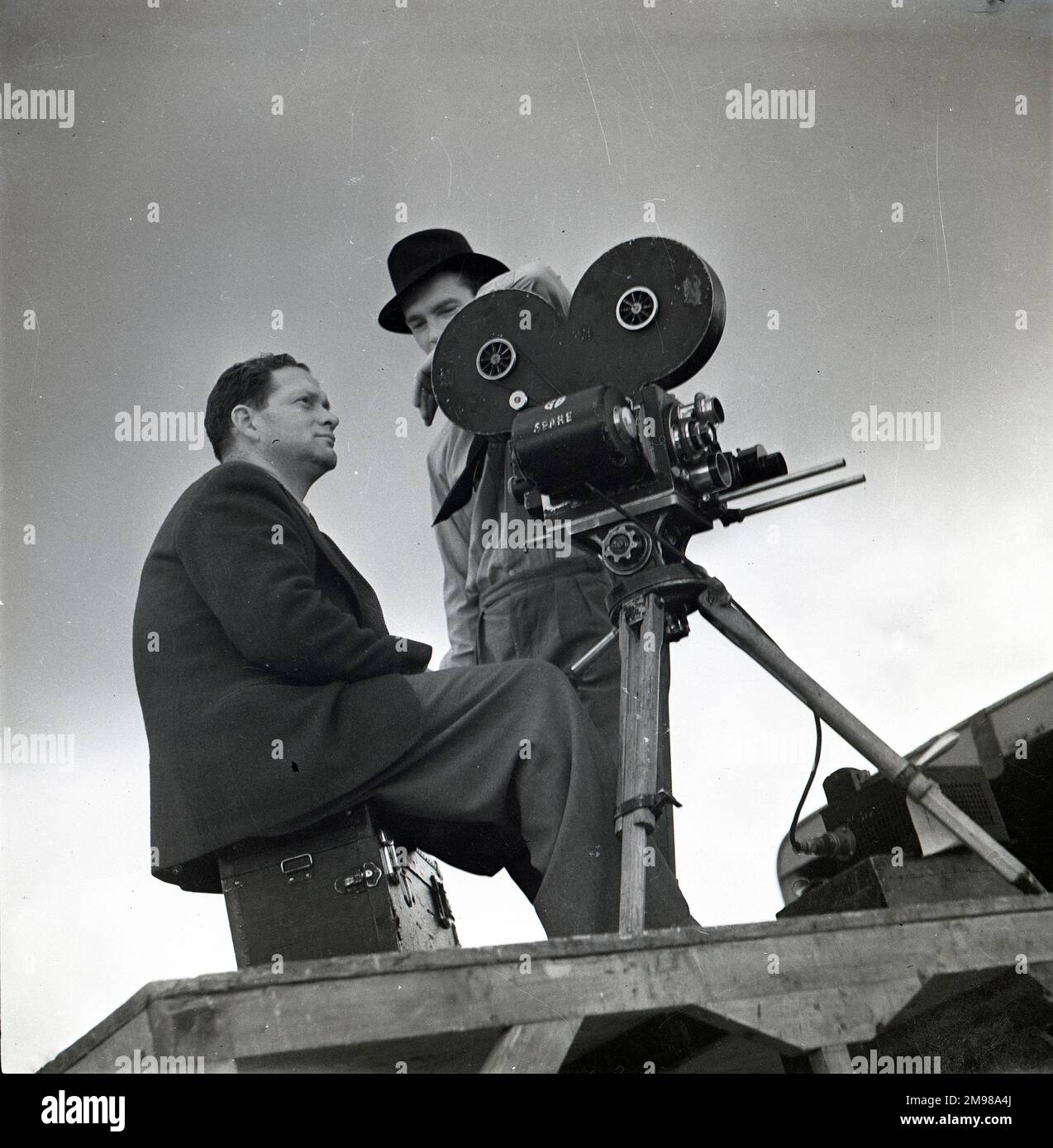 Georges Perinal (1897-1965), acclaimed French cinematographer, at work behind the camera on location for The First of the Few. His other films include Bonjour Tristesse, and The Life and Death of Colonel Blimp. Stock Photo