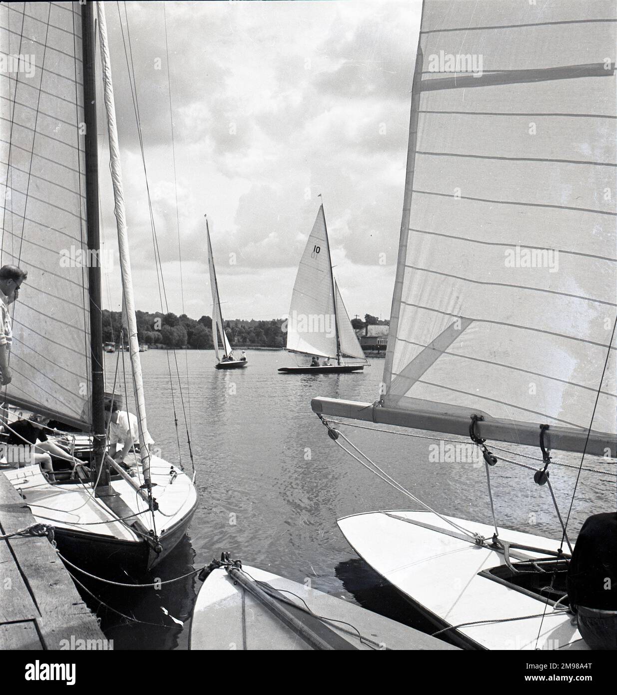 National 12 sailing dinghies on a Devon river one of a great series