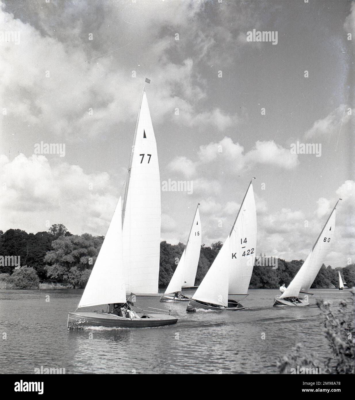 National 12 sailing dinghies on a Devon river one of a great series