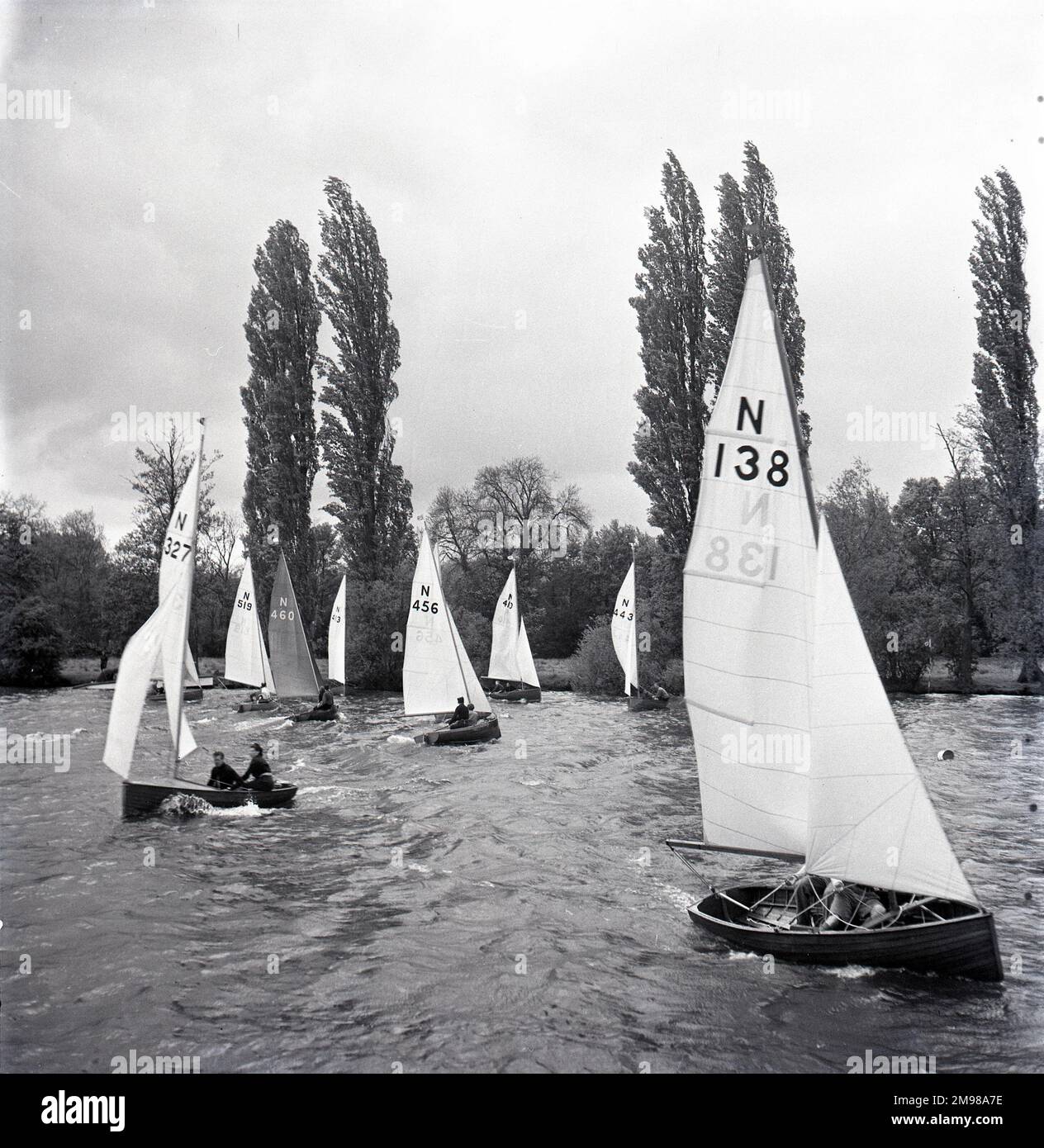 National 12 sailing dinghies on a Devon river one of a great series