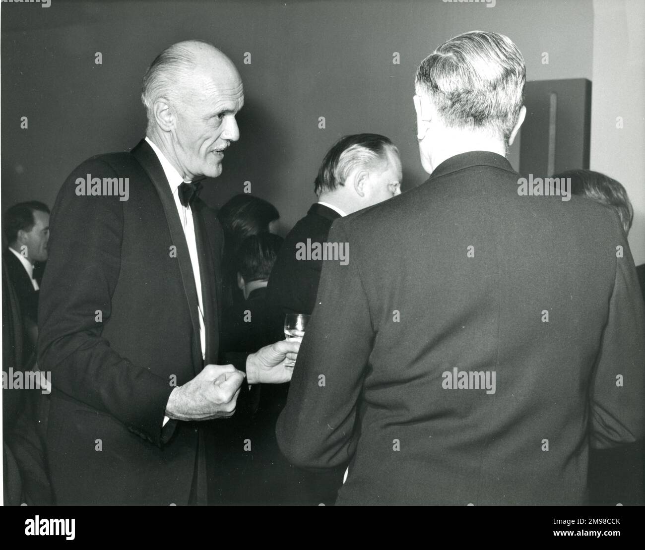Among the guests at the Centenary Conversazione held at the Science Museum on 12 January 1966 were Beverley Shenstone, left, and Dr Archie Ballantyne, RAeS Secretary, rear to camera. Stock Photo
