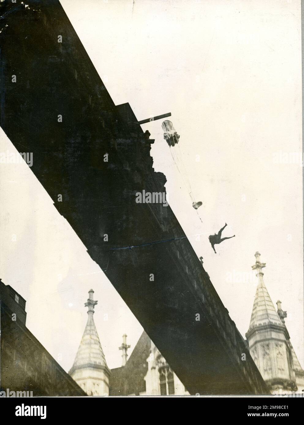 Lt Col Orde Lees diving head first from Tower Bridge to demonstrate a Guardian Angel parachute, 11 November 1917. Stock Photo