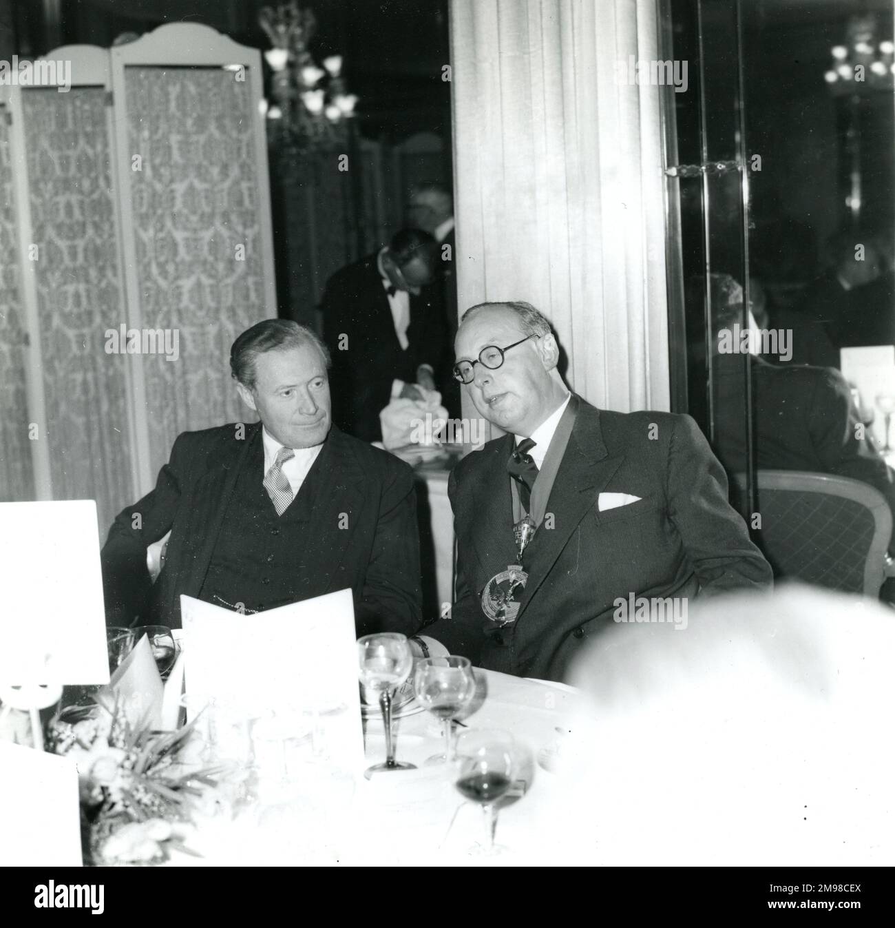 From left: Duncan Sandys, Minister of Aviation, and Peter Masefield, RAeS President 1959-1960, both discussed the White paper on Defence in their speeches at the 94th Anniversary Luncheon at the Dorchester Hotel, London, on 12 January 1960. Stock Photo