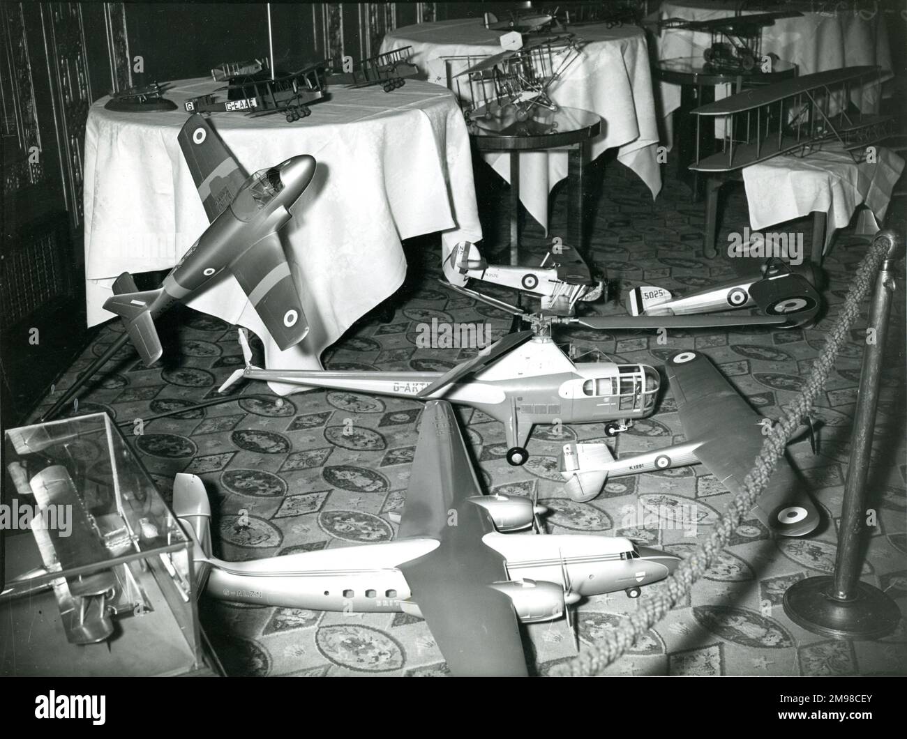 Aircraft models on display at the Dorchester Hotel, London, on 17 December 1953 at a Dinner honouring the 50th anniversary of the first powered controlled flights by the Wright brothers. The dinner was given by the Royal Aeronautical Society and the Royal Aero Club. Stock Photo