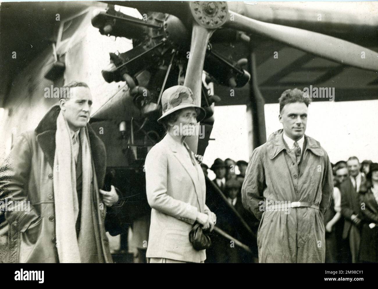 The Duchess of Bedford with Capt C.D. Barnard, left, pilot, and Robert ?Bob? Little in front of their Fokker FVII, G-EBTS, The Spider, in August 1929 following their record-breaking flight of 10,000 miles from Lympne Airport to Karachi (then in India) and return to Croydon Airport in eight days. Stock Photo