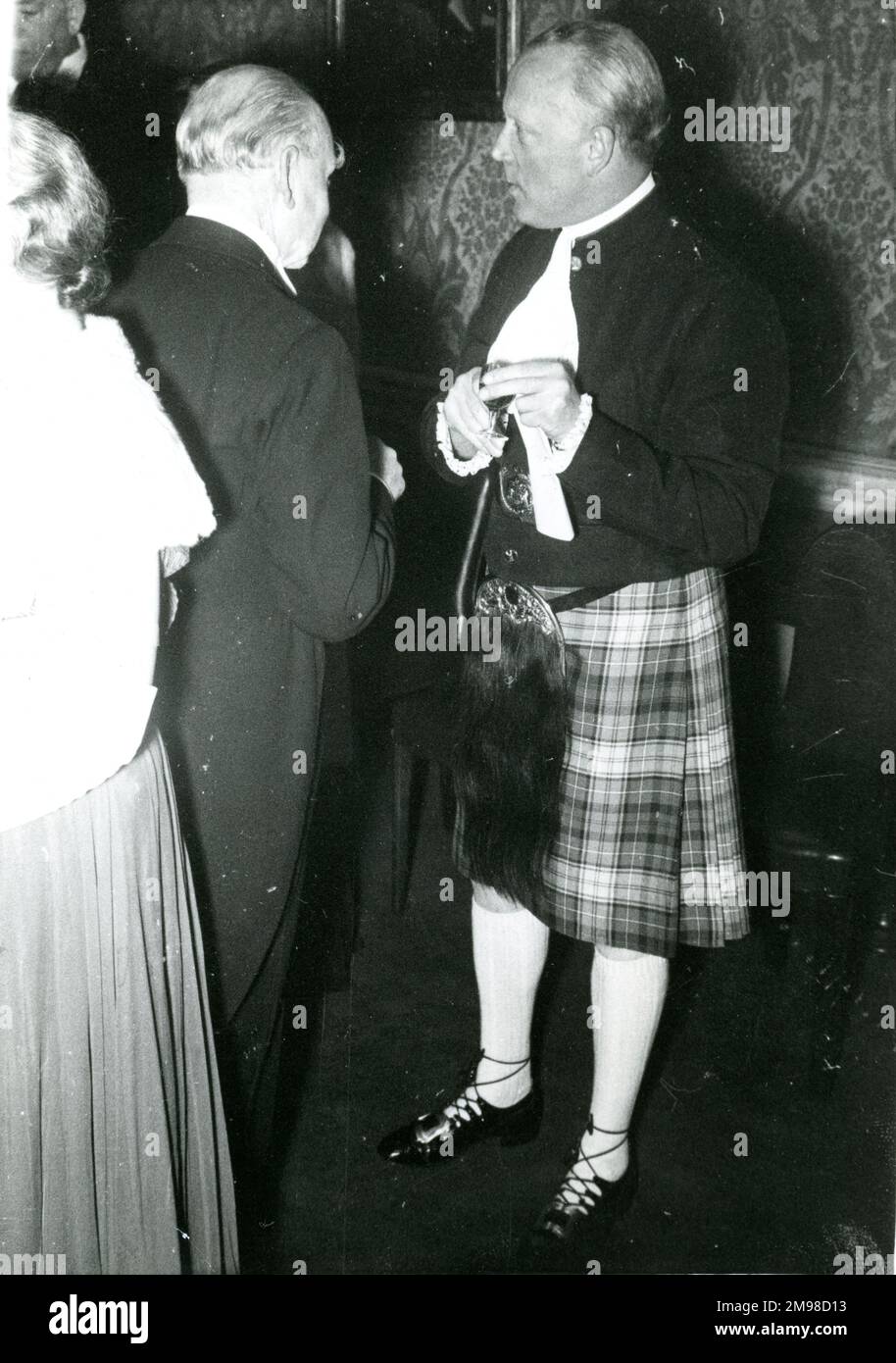 The Royal Aeronautical Society held a dinner at No.4 Hamilton Place in 1949 to celebrate the granting of its Royal Charter dated 22 December 1948. ACM Sir Frederick Bowhill, left, and Lord Sempill. Stock Photo