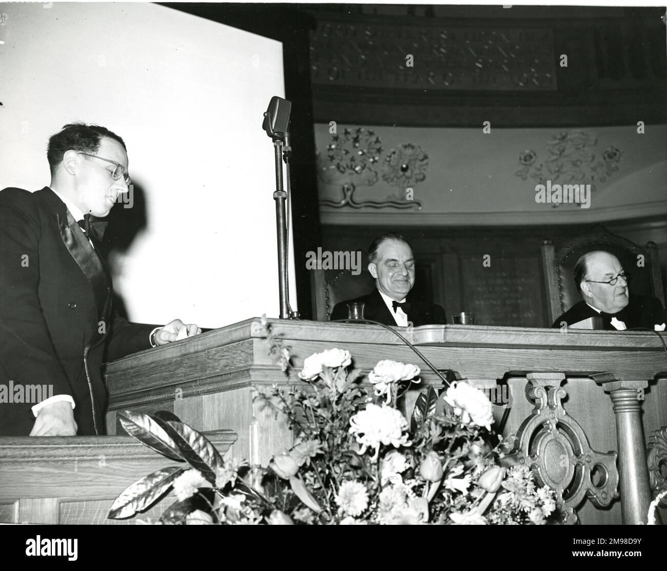 Peter Hearne, chairman of the Graduates? and Students? Section, left, seconds the vote of thanks at the fourth Royal Aeronautical Society President?s address and reception at the Assembly Hall, Church House, Westminster, London, on 10 January 1957. Stock Photo