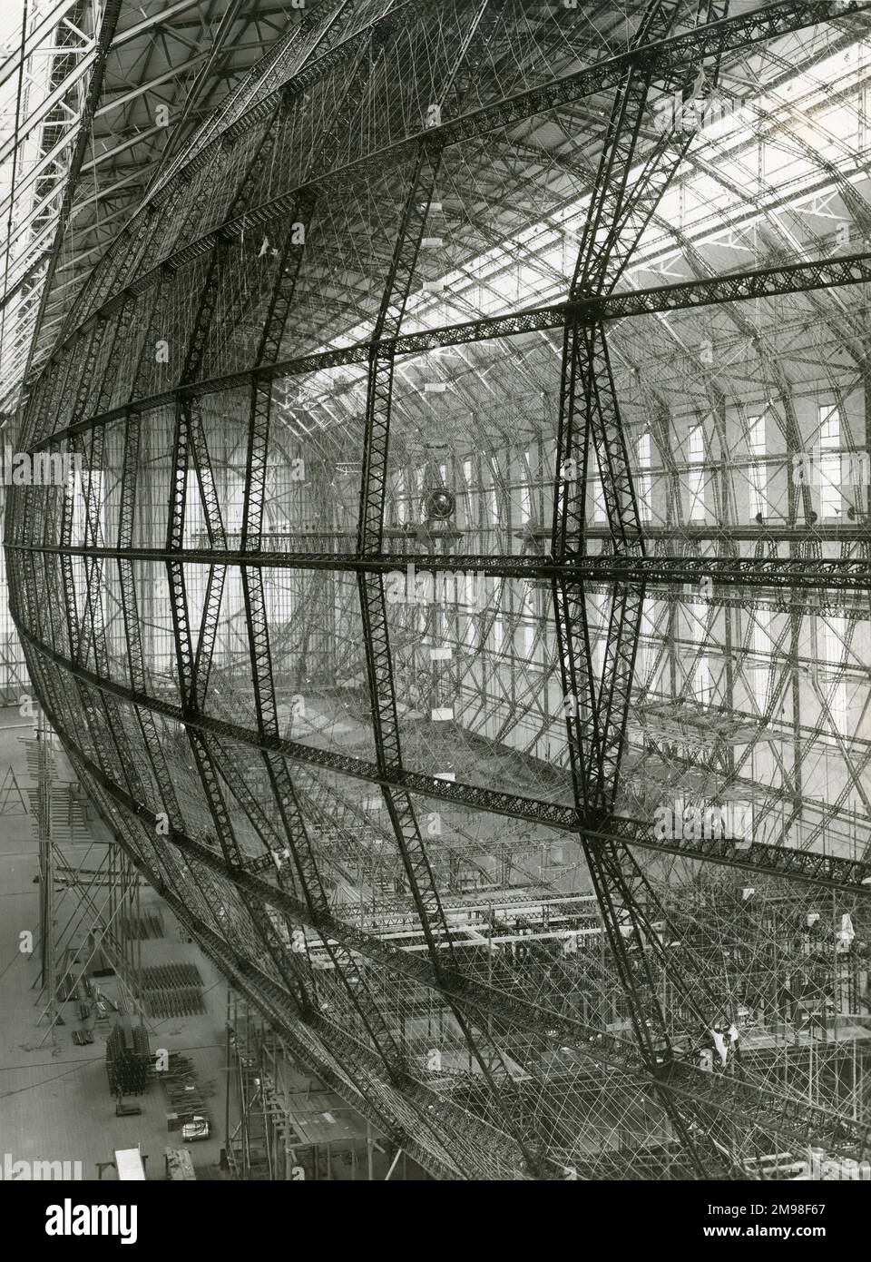 Assembled at Friedrichshafen during 1932-1936, the Hindenburg?s hull was composed of a ring structure of duralumin girders and bracing wires. Stock Photo