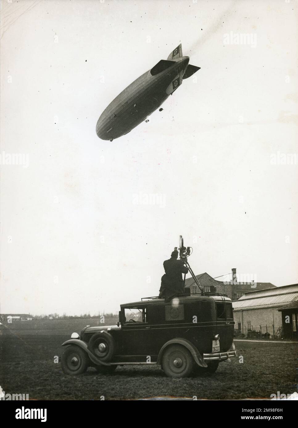 The LZ129 Hindenburg over Friedrichshafen on 4 March 1936, during its first flight which lasted three hours. Stock Photo