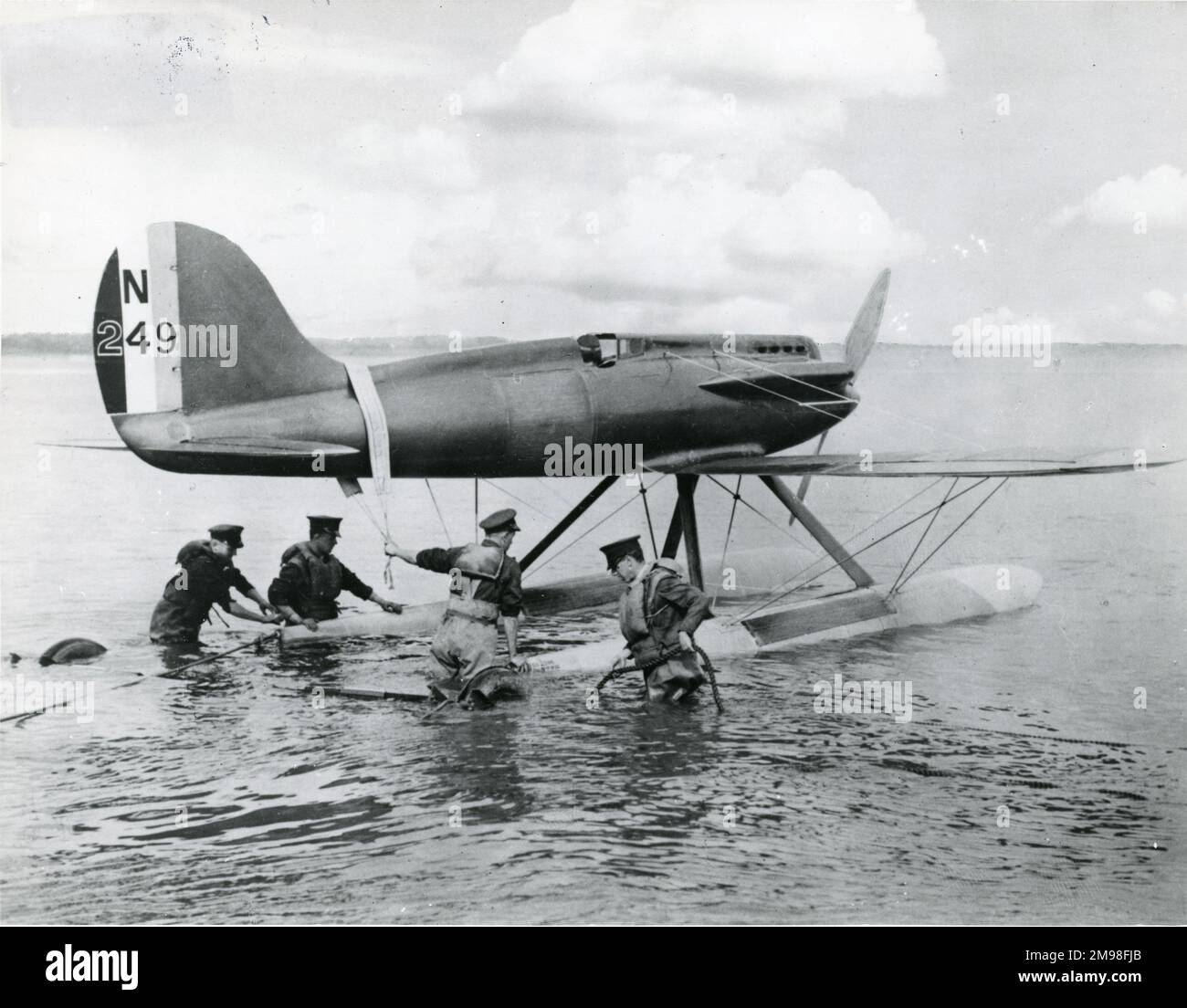 The High Speed Flight handling party launch Gloster VI, N249, Golden Arrow, at Calshot in September 1929. Stock Photo