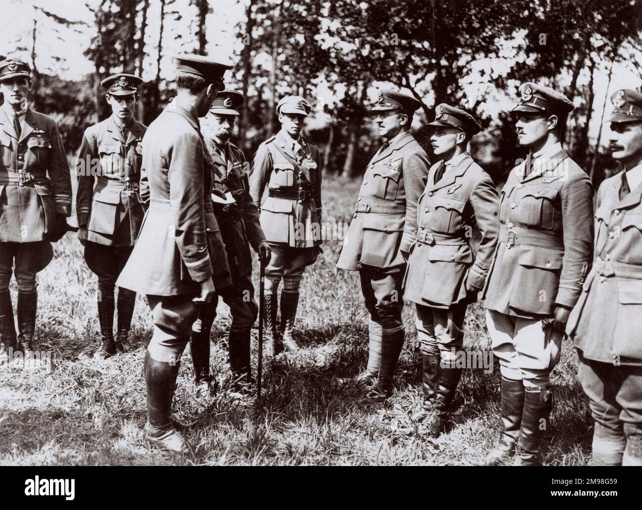 King George V inspecting RAF officers on the Western Front in France during World War One, August 1918. The men belonged to the 11th and 2nd Balloon Wings (air reconnaissance). Stock Photo