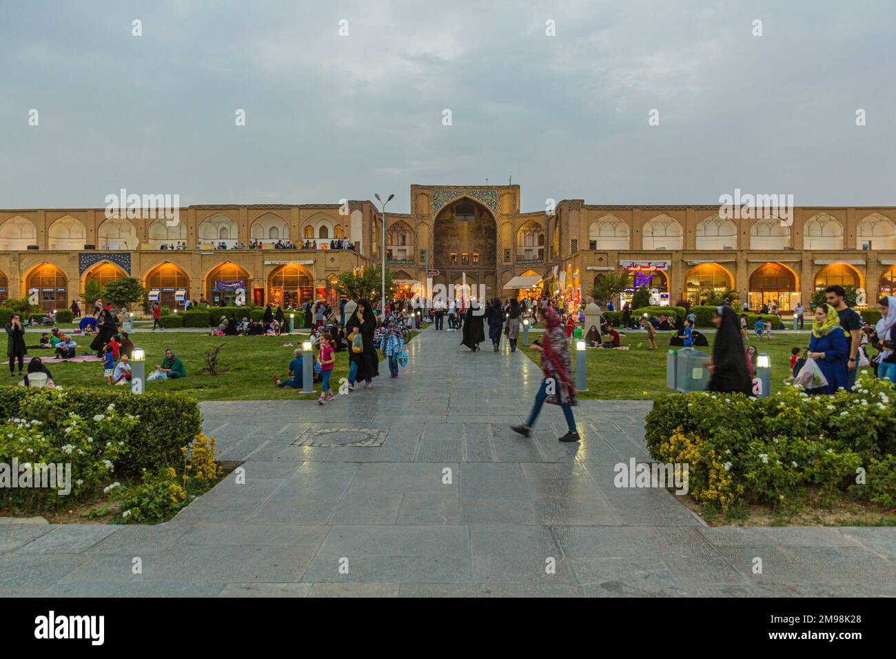 ISFAHAN, IRAN - JULY 10, 2019: People enjoying evening at Naqsh-e Jahan Square in Isfahan, Iran Stock Photo