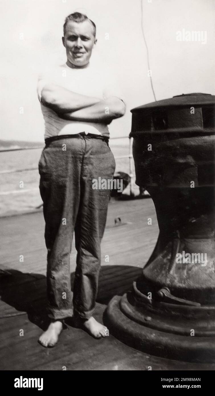 Sailor posing for the camera on the deck of the four-masted steel ...
