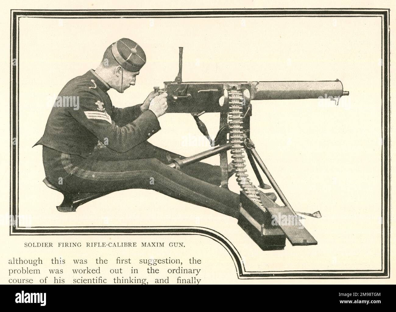 Soldier firing rifle-calibre Maxim Gun. Stock Photo