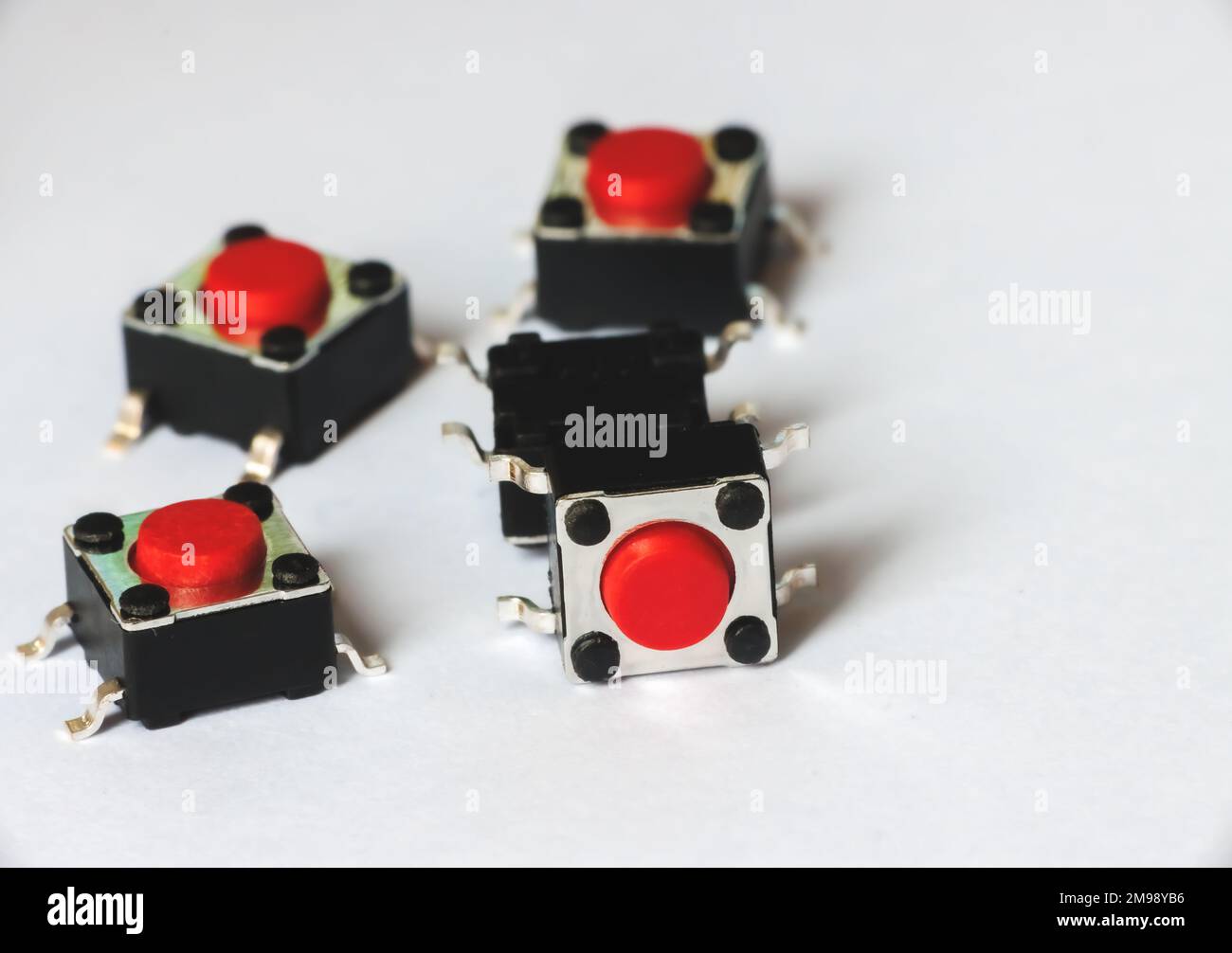Five tact switch, red pushbutton switch Stock Photo