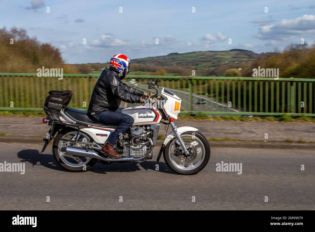1982 80s eighties White HONDA CX 500 Sports motorcycle; travelling on the M61 motorway, UK Stock Photo