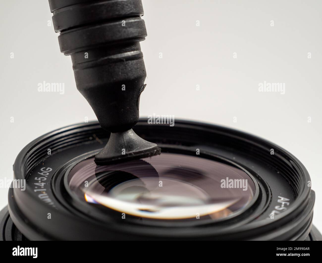 The lens cleaning brush cleans the lens. Brush for cleaning the lens on