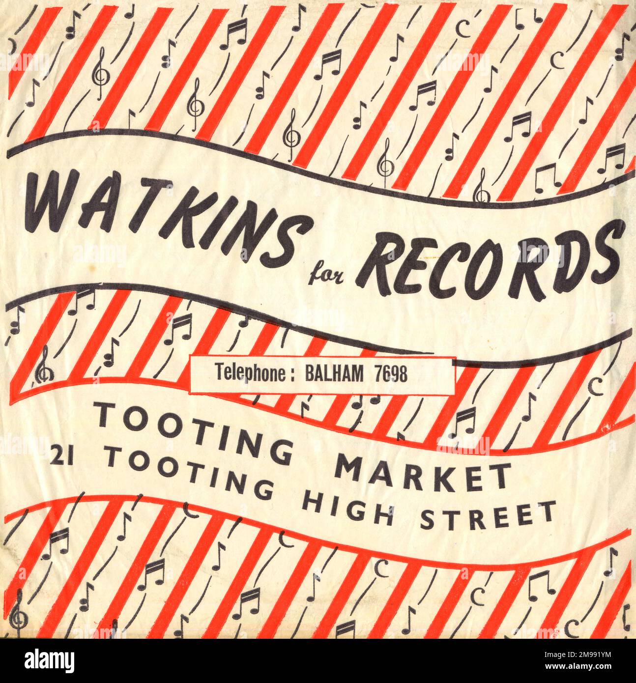 Vintage paper bag for Watkins record stall at Tooting Market, Tooting High Street, SW London. Stock Photo