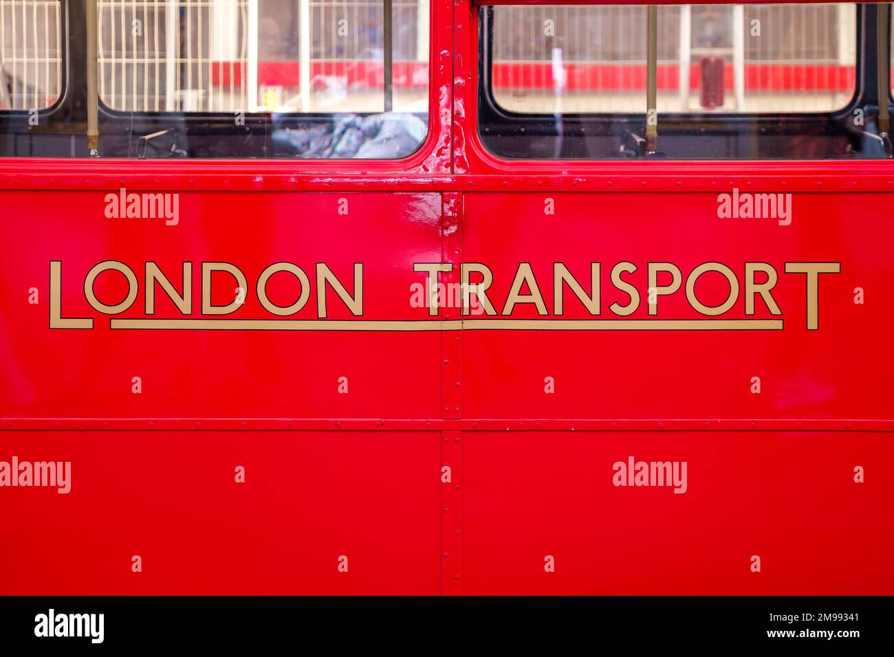 Detail of a red double-decker bus seen in Oxford Street in London, UK. Stock Photo