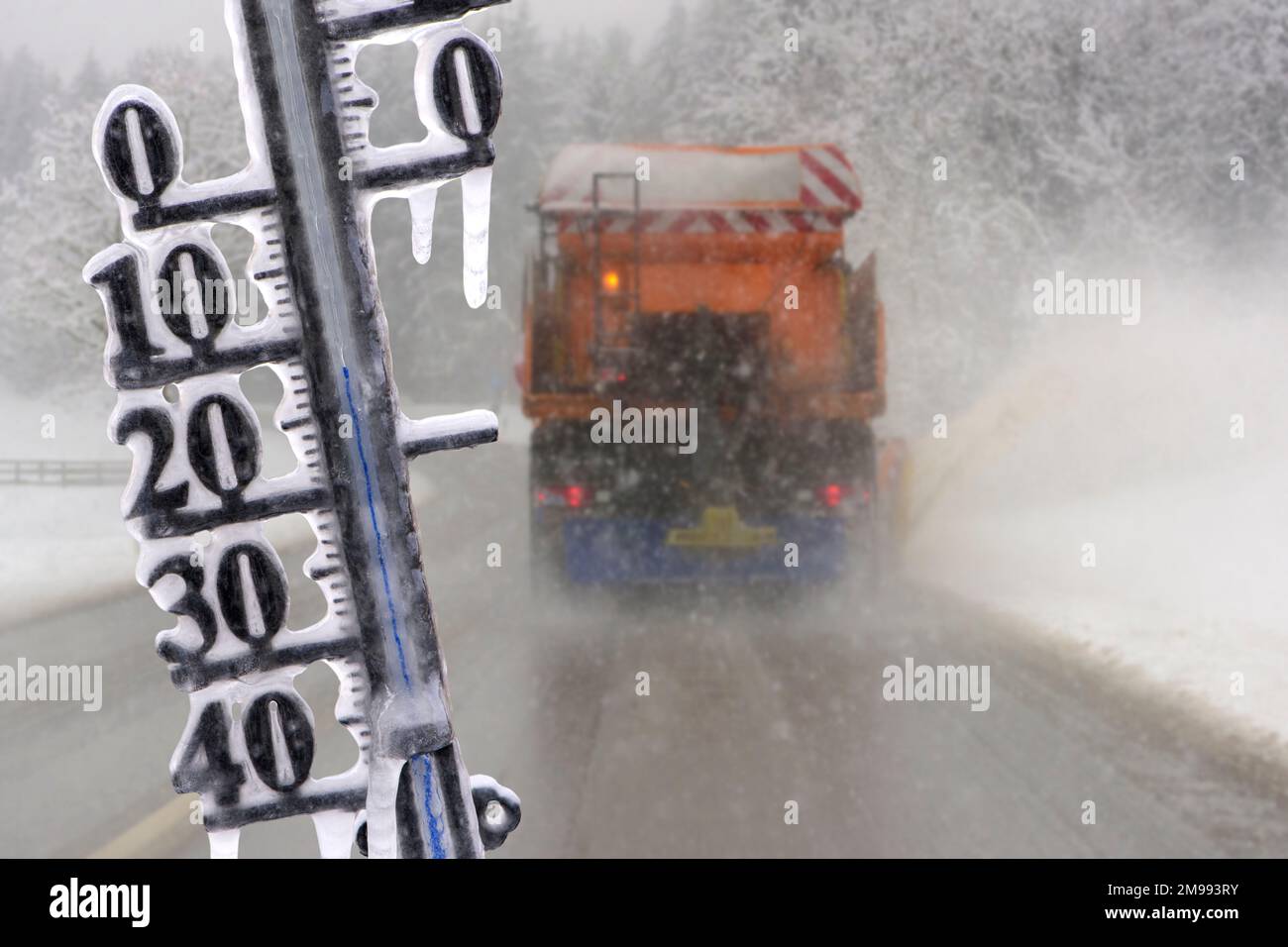 Thermometer shows cold temperatures on road Stock Photo