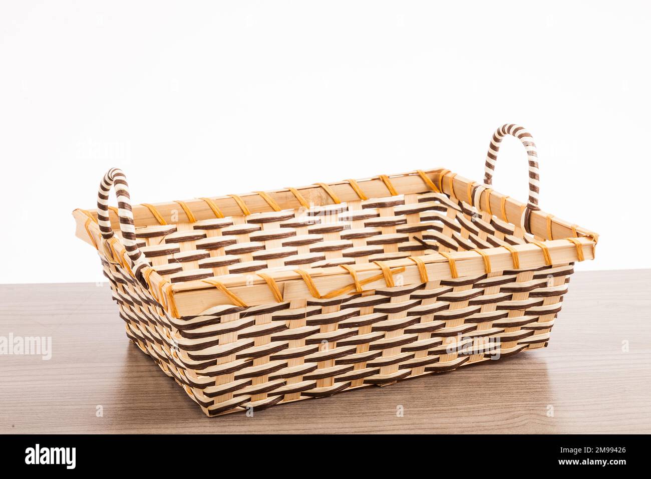 An empty Wicker Basket On White Background Stock Photo - Alamy