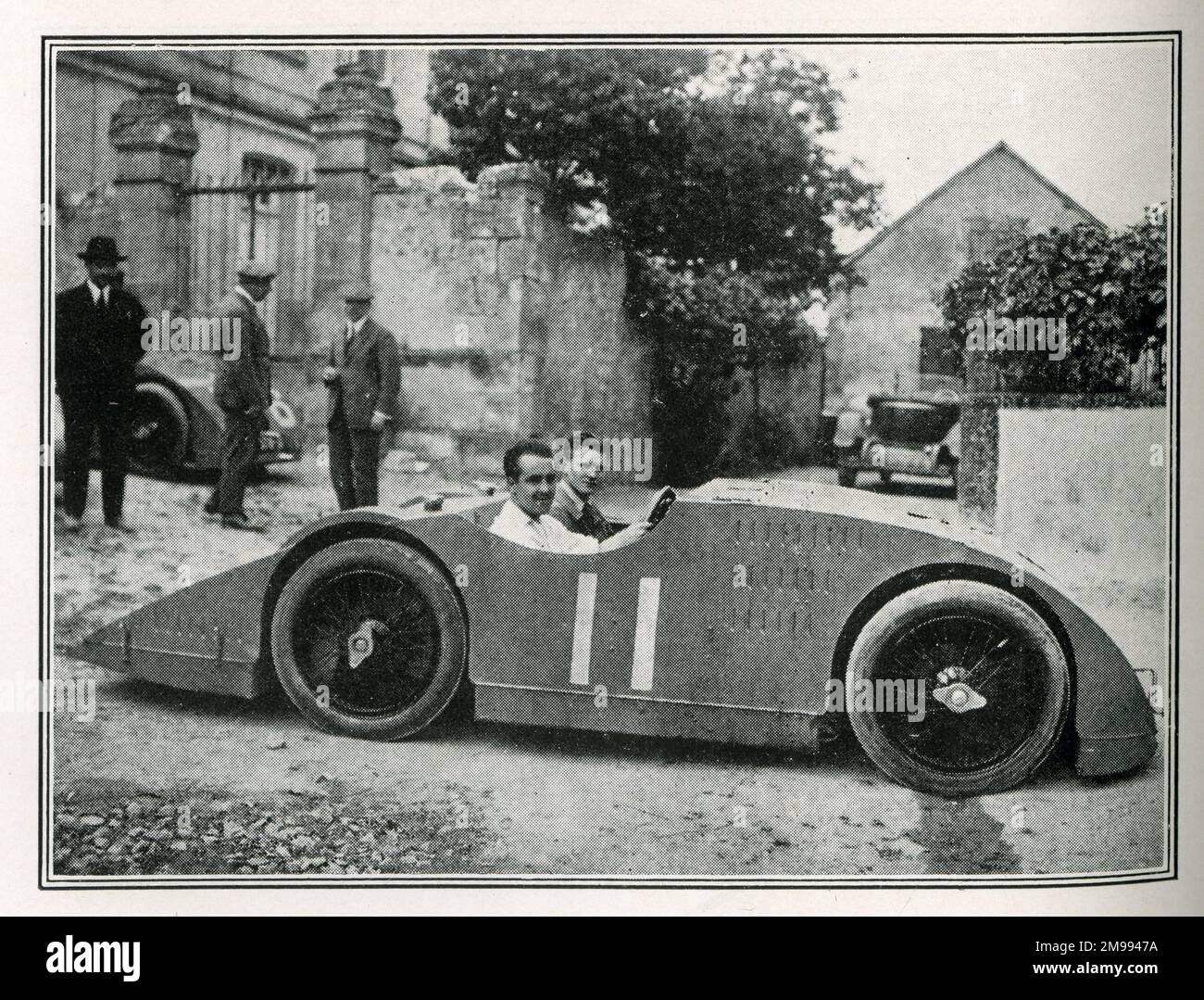 Early Motor Car Racing - Grand Prix 1923 with Pierre de Viscaya in a Bugatti. Stock Photo
