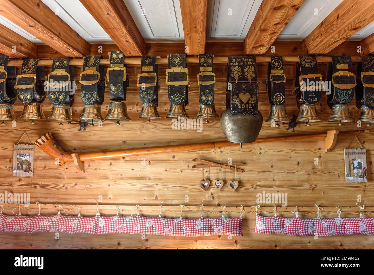 Cow bells displayed in restaurant of mountain farm. Vosges, Alsace