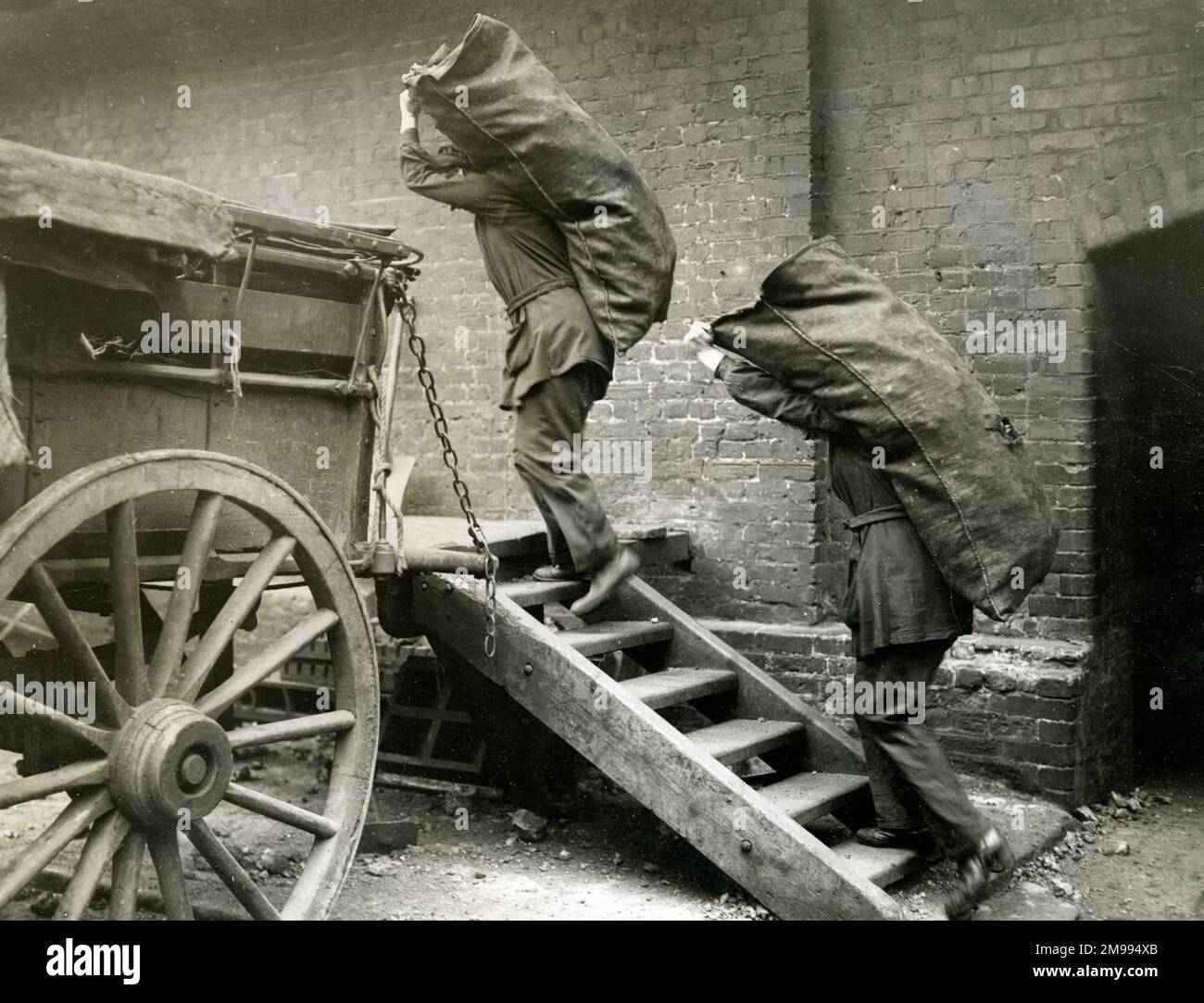 Women workers loading a coke cart at a London Gas Works during the