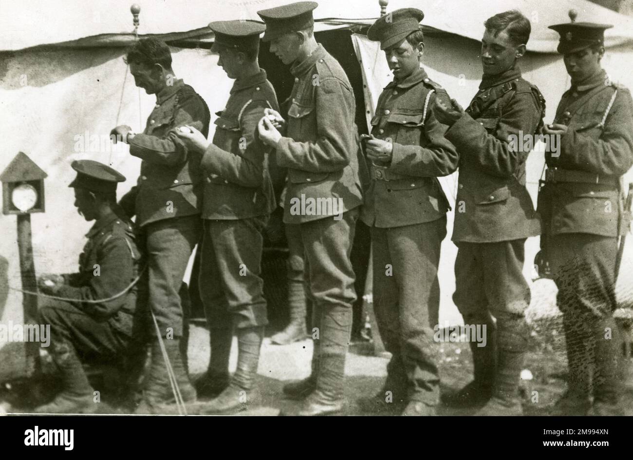 Punctuality - soldiers synchronise their watches in France before