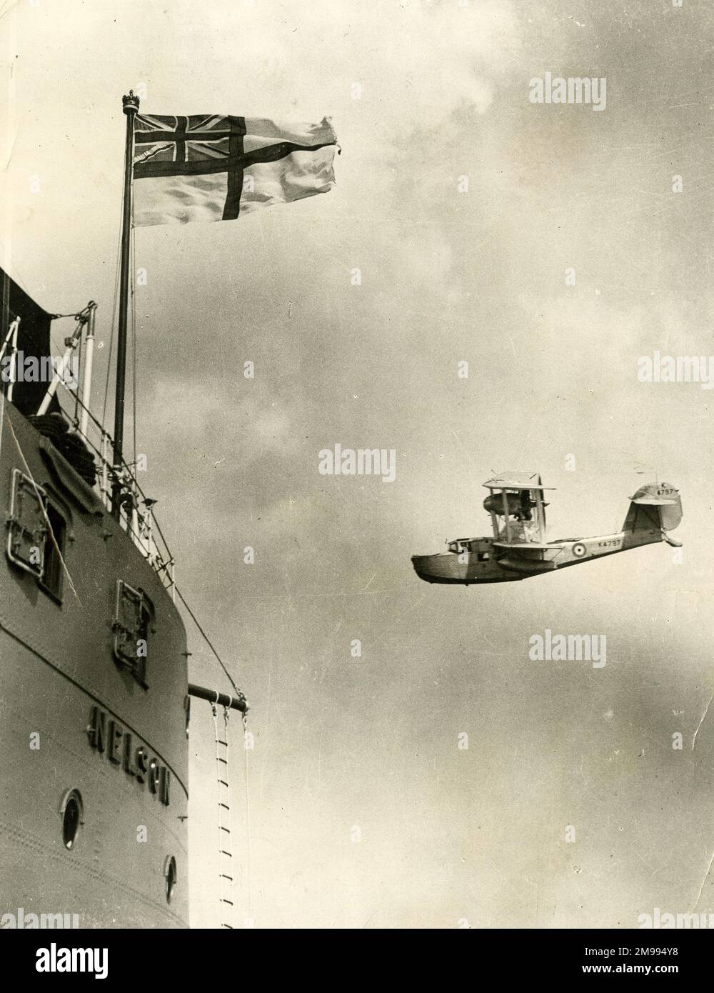 Coastal Reconnaissance seaplane and the stern of the Battleship Nelson