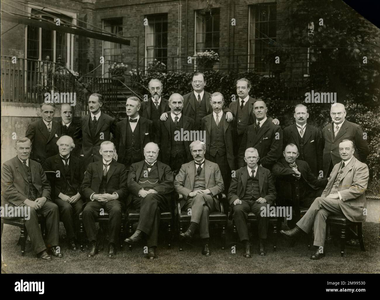 Group photo, Ramsay MacDonald's Cabinet in the first Labour Government. Front row (left to right): Adamson, Lord Parmoor, Snowden, Lord Haldane, MacDonald, Clynes, Thomas, Henderson. Second row: Trevelyan, Walsh, Lord Thomson, Lord Chelmsford, Olivier, Buxton, Wedgwood, Hartshorn, Shaw. Back row: Webb, Wheatley, Jowett. Stock Photo