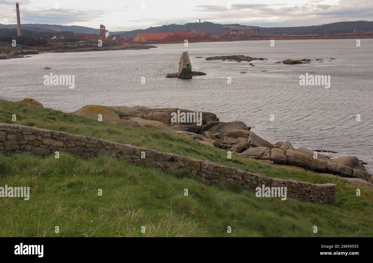 a wall made of stone and the Cantabrian sea Stock Photo
