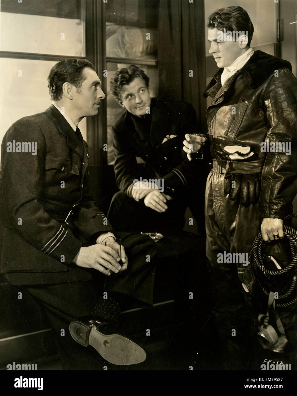 Still from the war film, International Squadron (Flight Patrol American), starring Ronald Reagan, Olympe Bradna and James Stephenson. Stock Photo