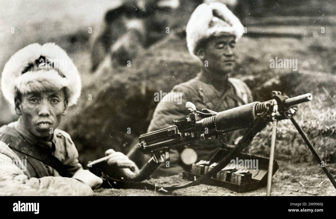 Japanese machine gunners fighting the Chinese at Chinchow (Jinzhou), China. Stock Photo