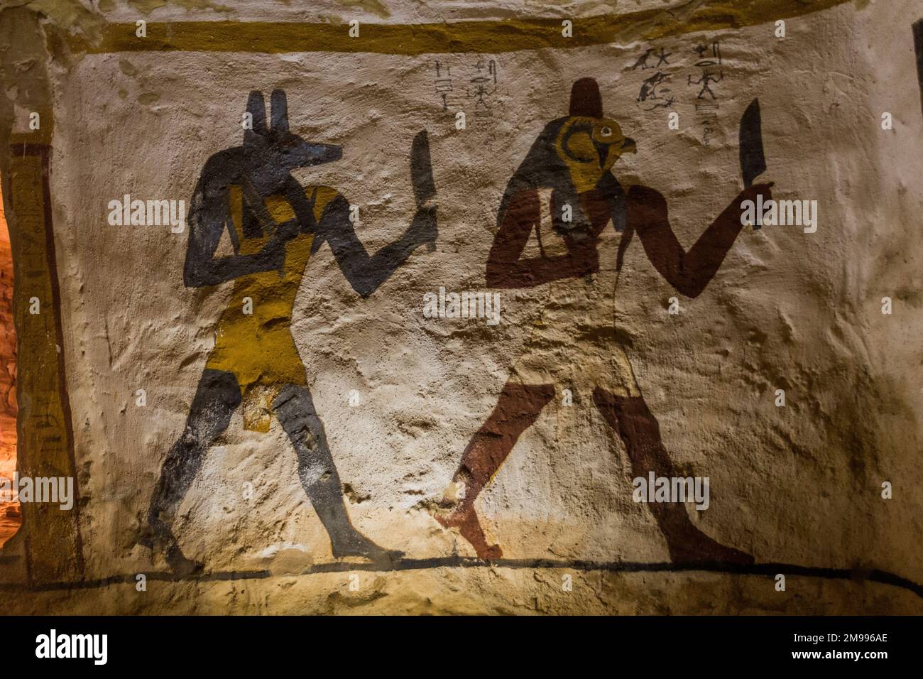 BAWITI, EGYPT - FEBRUARY 5, 2019: Wall painitngs in the Zed Amun Ef Ankh Tomb in Bahariya oasis, Egypt Stock Photo