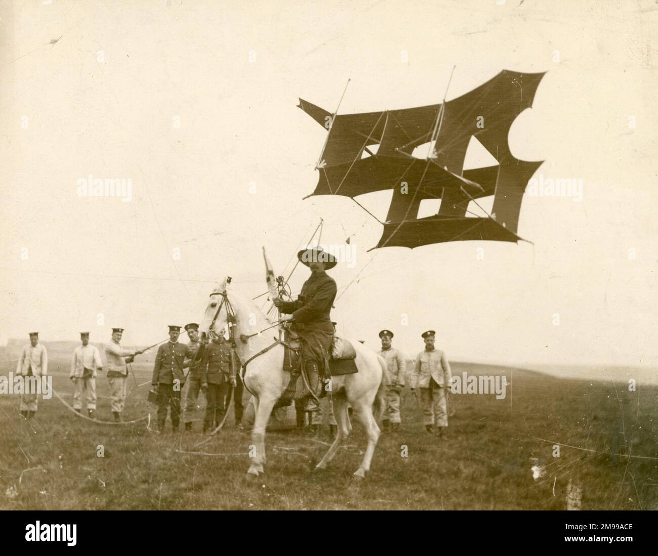 Man lifting kites hires stock photography and images Alamy