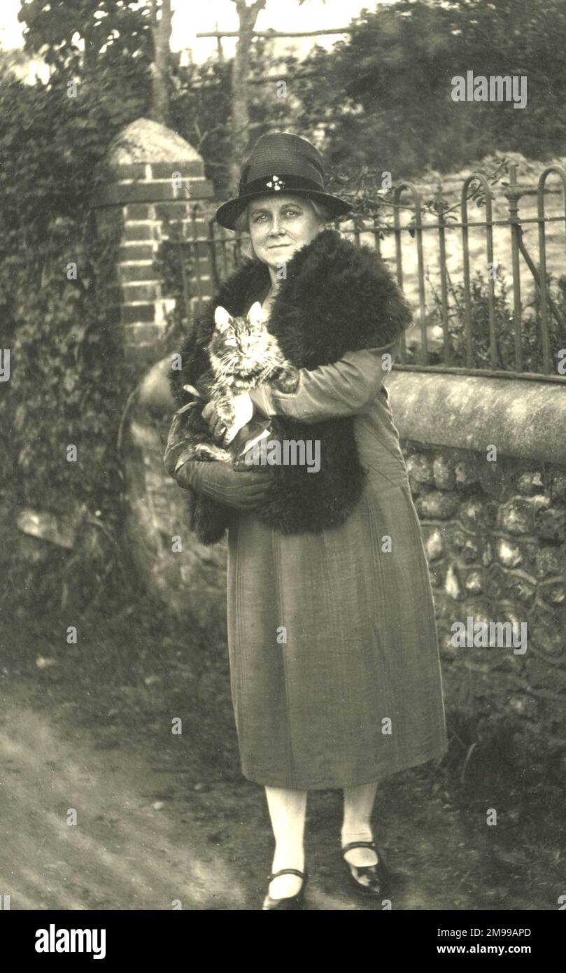 Woman holding a cat Stock Photo