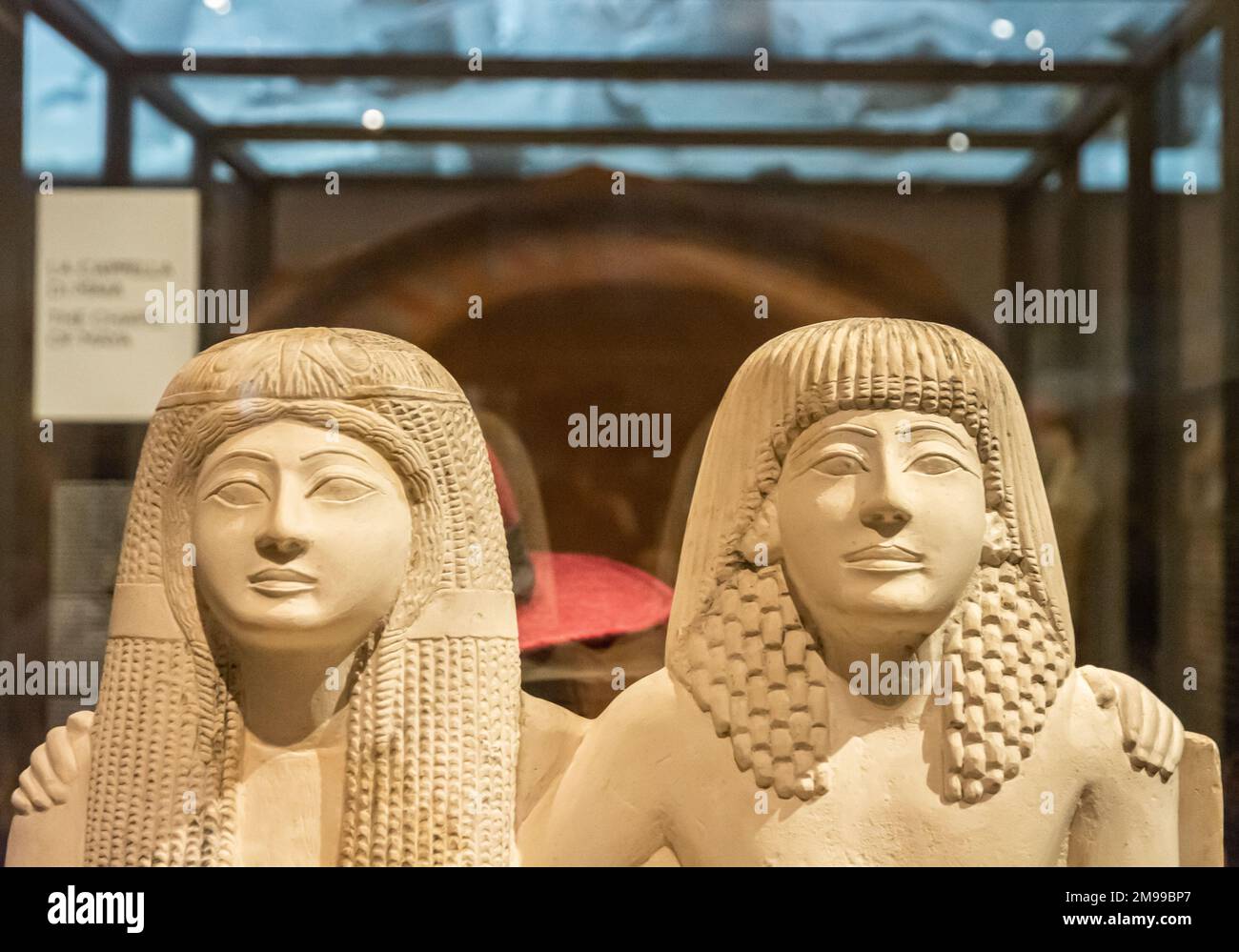 Ancient Roman statue of Pendua and his wife Nefertari, limestone, New Kingdom, 19th Dynasty,(1292-1186 BC) - Egyptian Museum Turin, Piedmont, Italy Stock Photo