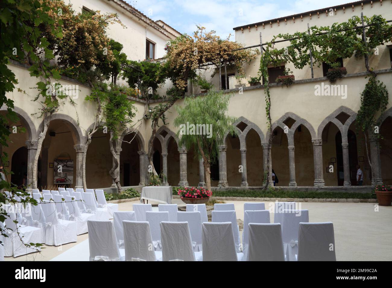 Wedding seating in the beautiful cloistered courtyard of the 14th century Chiostro di San Francesco, Sorrento, Campania, Italy Stock Photo