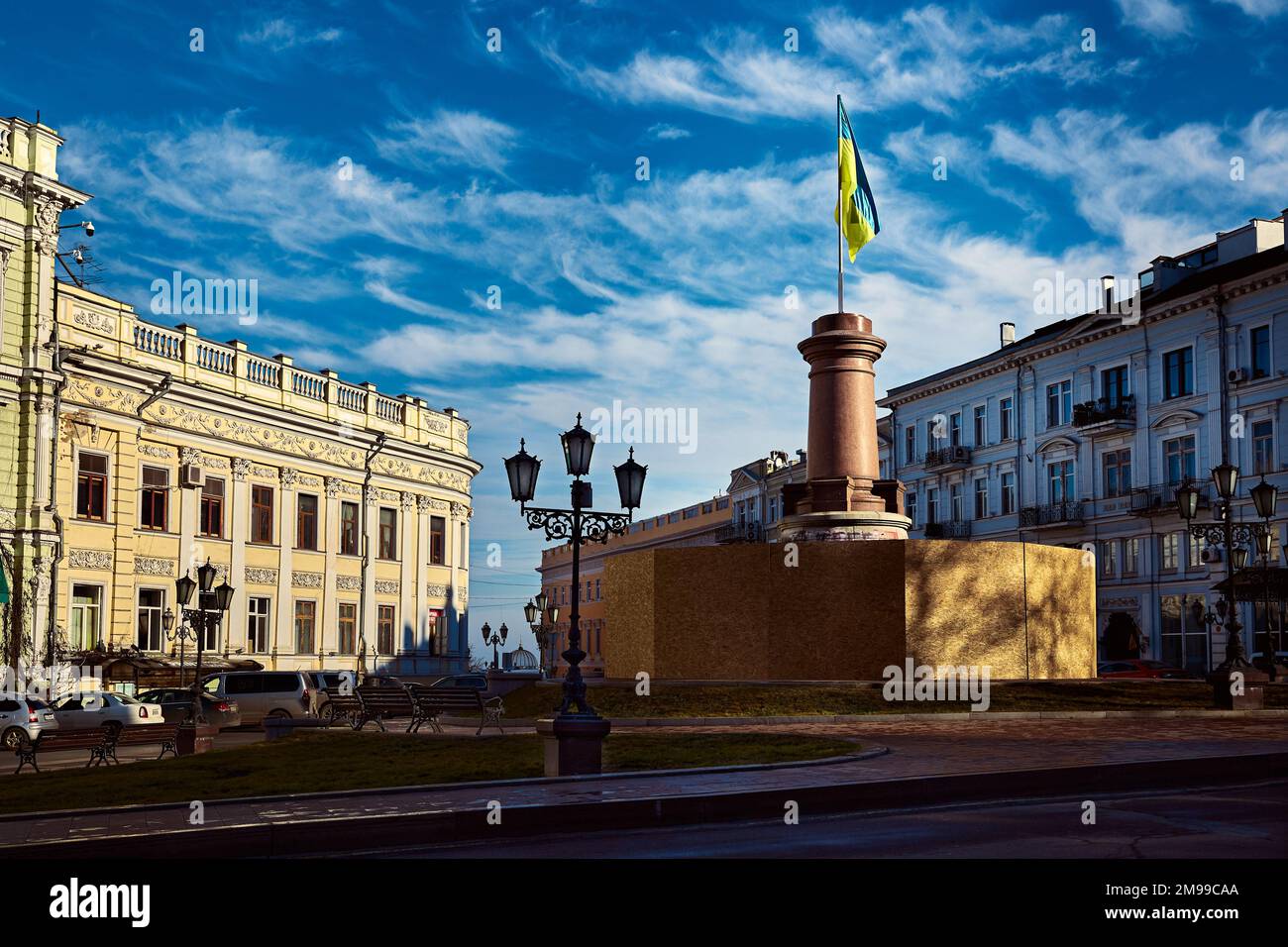 Ekaterininskaya square with dismantled monument of Ekaterine II and developing Ukrainian flag on a empty pedestal. Odessa Ukraine Stock Photo