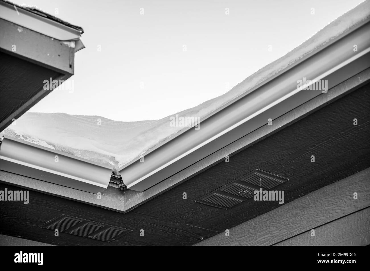 Metal gutters be installed on a residential buildings with two sections