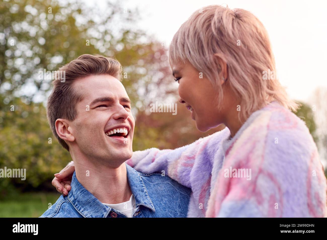 Love couple hugging in nature hi-res stock photography and images - Alamy